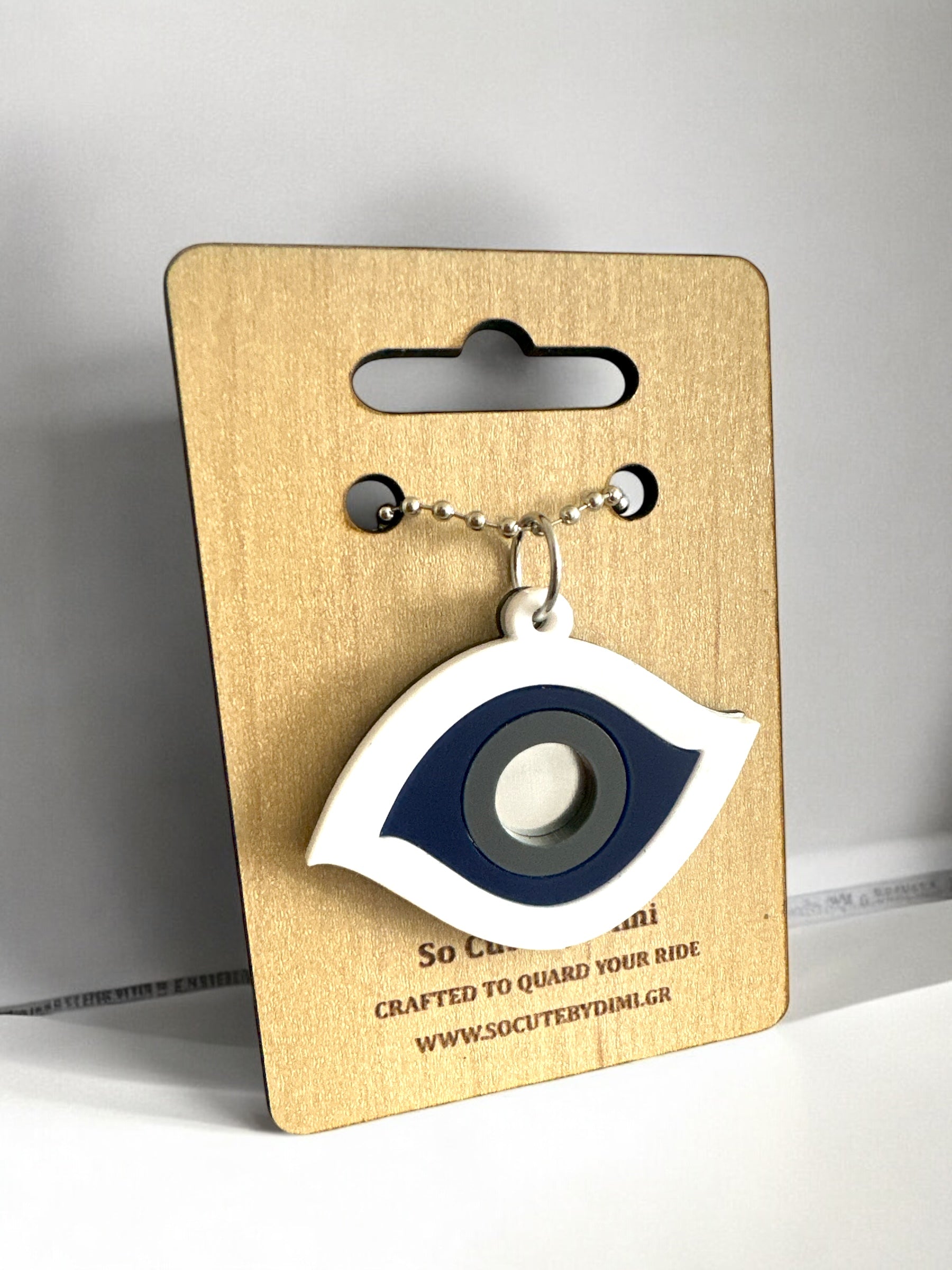 Γούρι αυτοκινήτου μάτι από λευκό και μπλε plexiglass με ασημί καθρέφτη στο κέντρο – design Drive Icons