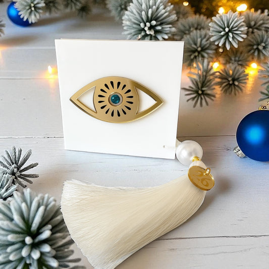 Χειροποίητο γούρι μάτι λευκό-χρυσό με πέρλα και φούντα – So Cute by Dimi Wholesale