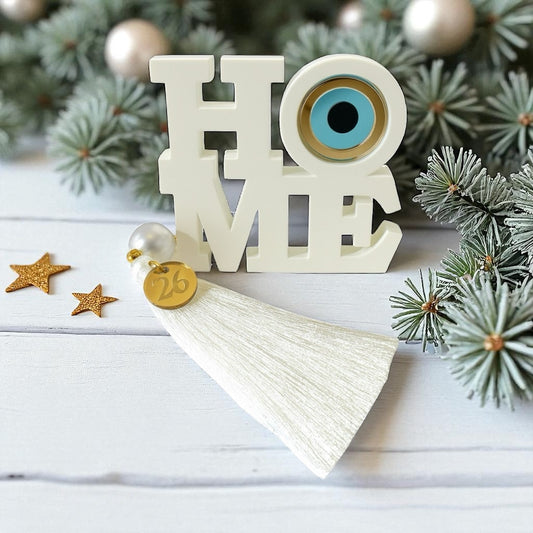 Χειροποίητο γούρι HOME με μάτι, πέρλα και φούντα – So Cute by Dimi Wholesale