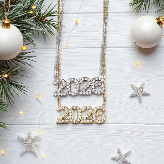 Κολιέ γούρι 2026 χονδρική – ατσάλι με ζιργκόν σε χρυσό & ασημί