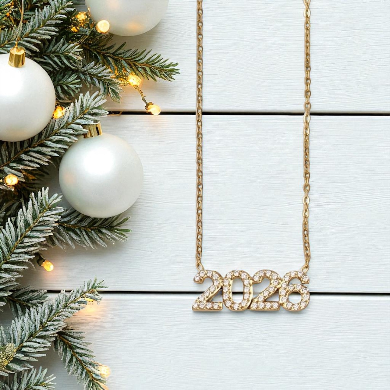 Κολιέ γούρι 2026 χονδρική – ατσάλι με ζιργκόν σε χρυσό & ασημί