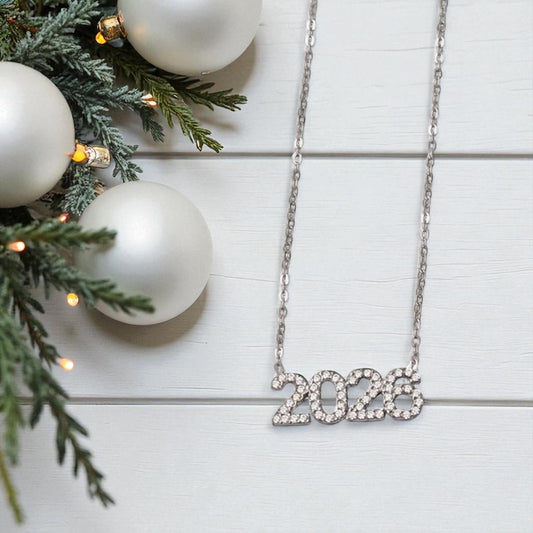 Κολιέ γούρι 2026 χονδρική – ατσάλι με ζιργκόν σε χρυσό & ασημί