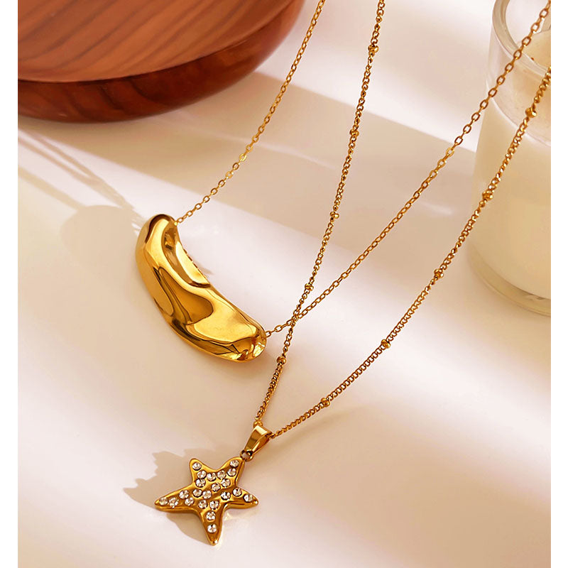 Ατσάλινο κολιέ με χρυσό αστέρι και κρύσταλλα – Χονδρική So Cute by Dimi