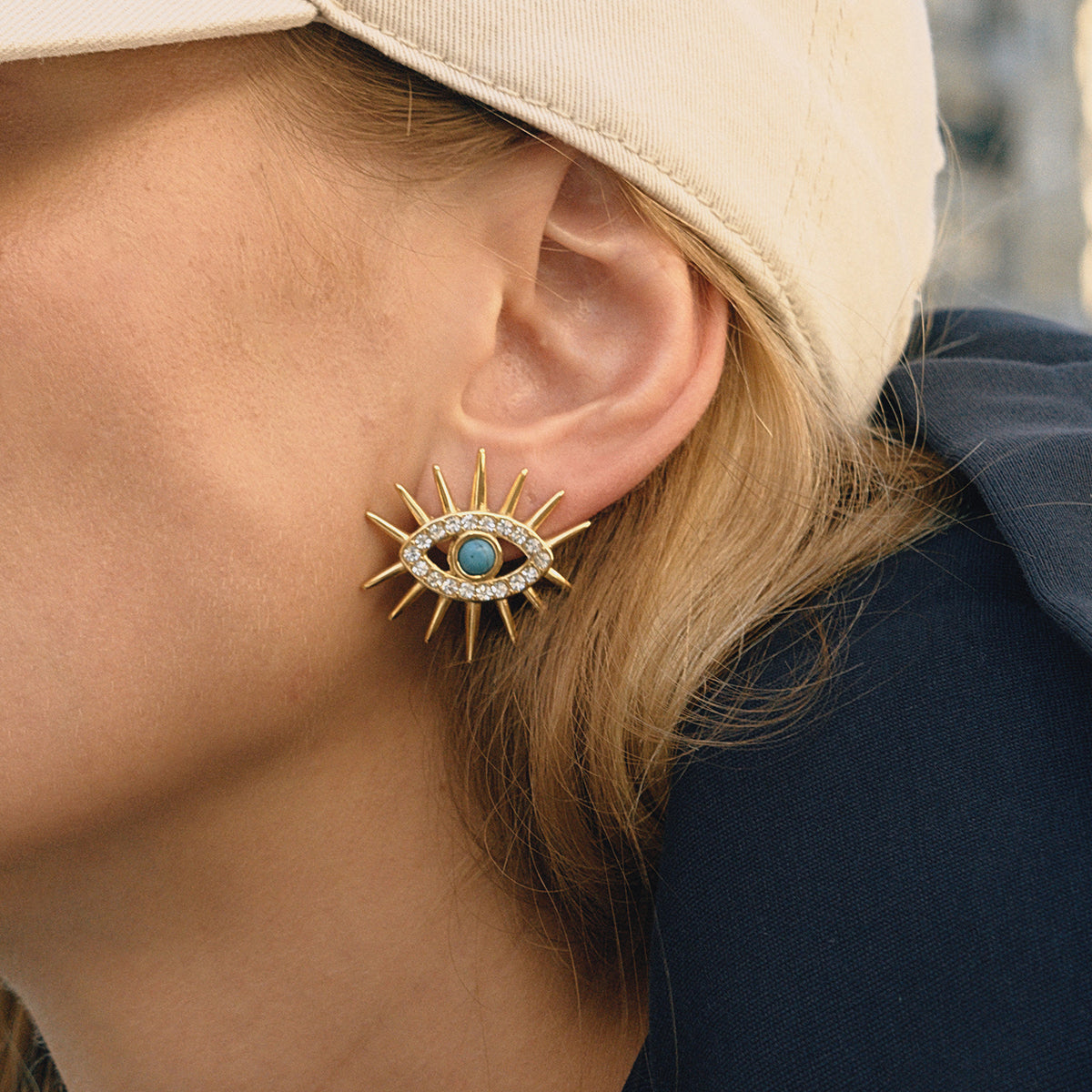 Σκουλαρίκια “Solar Eye” – Ατσάλινα με τιρκουάζ μάτι και ζιργκόν | So Cute by Dimi Wholesale