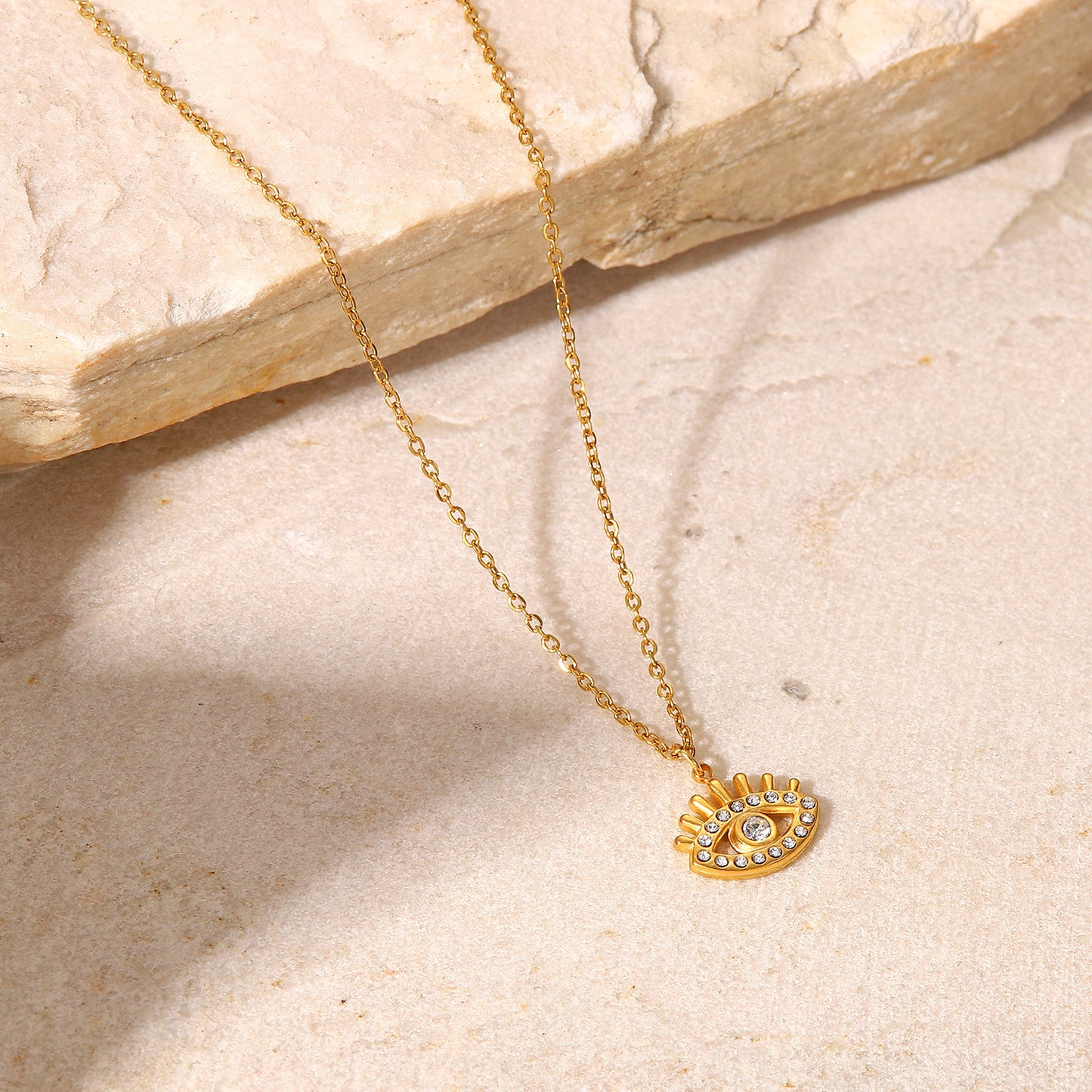 Fashion 18K Gold Hollow Devil's Eye Zircon Titanium Steel Pendant Stainless Steel Necklace