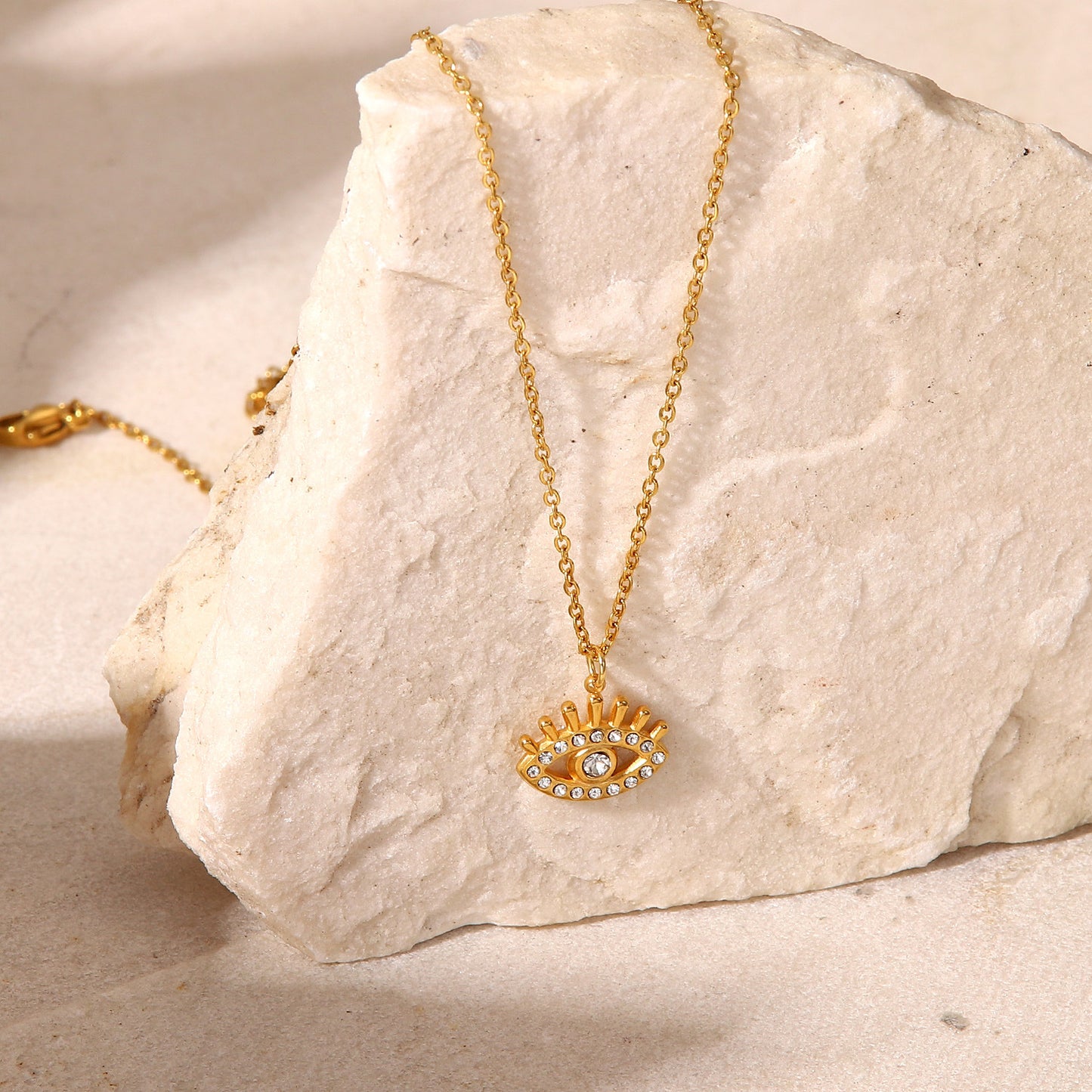 Fashion 18K Gold Hollow Devil's Eye Zircon Titanium Steel Pendant Stainless Steel Necklace
