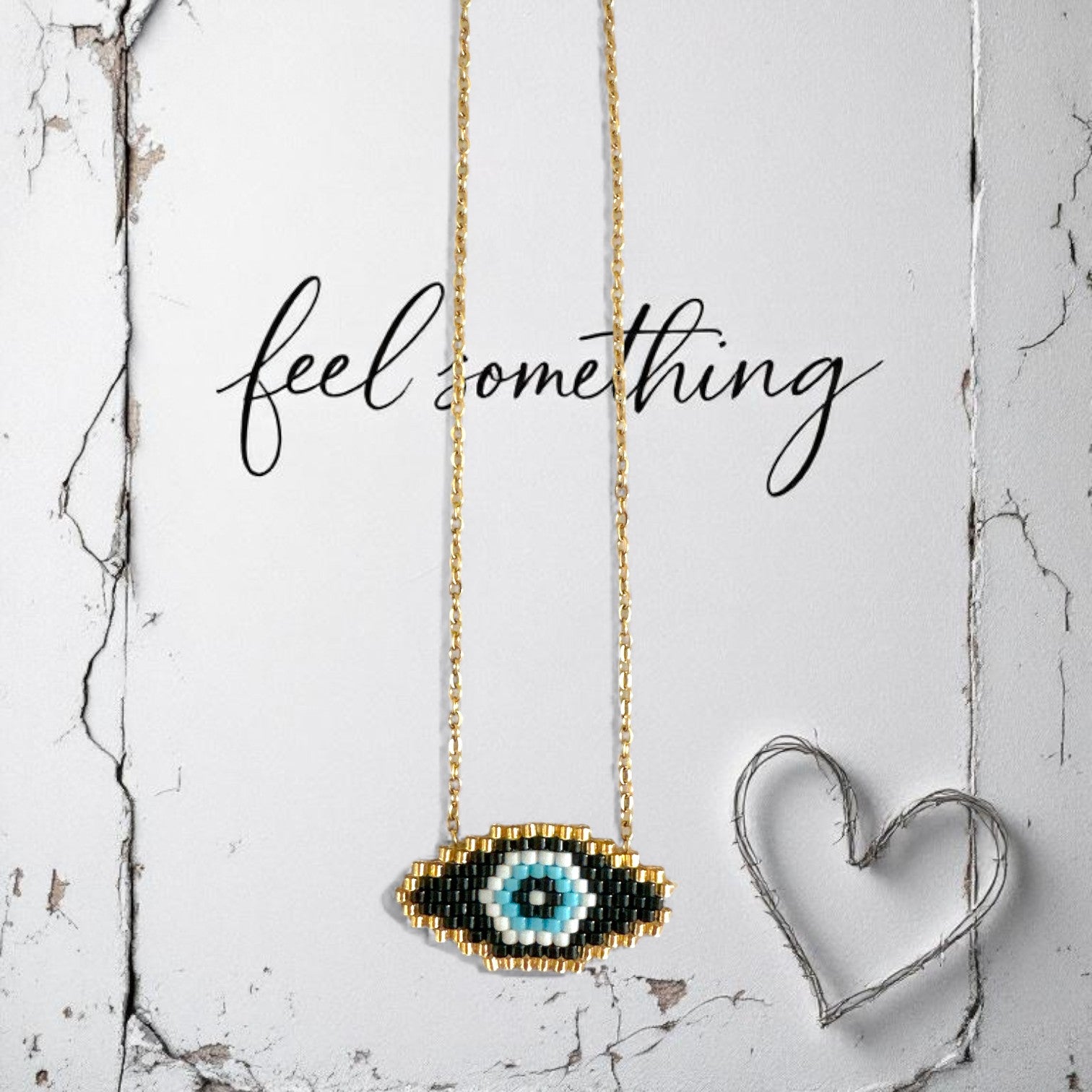 Χρυσό ατσάλινο κολιέ με eye charm Miyuki So Cute by Dimi