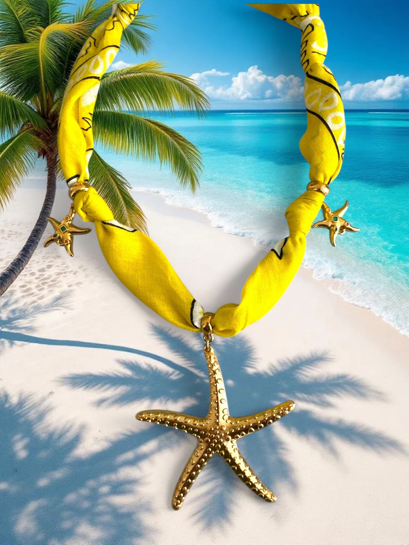 Yellow bandana necklace with a starfish pendant on a tropical beach