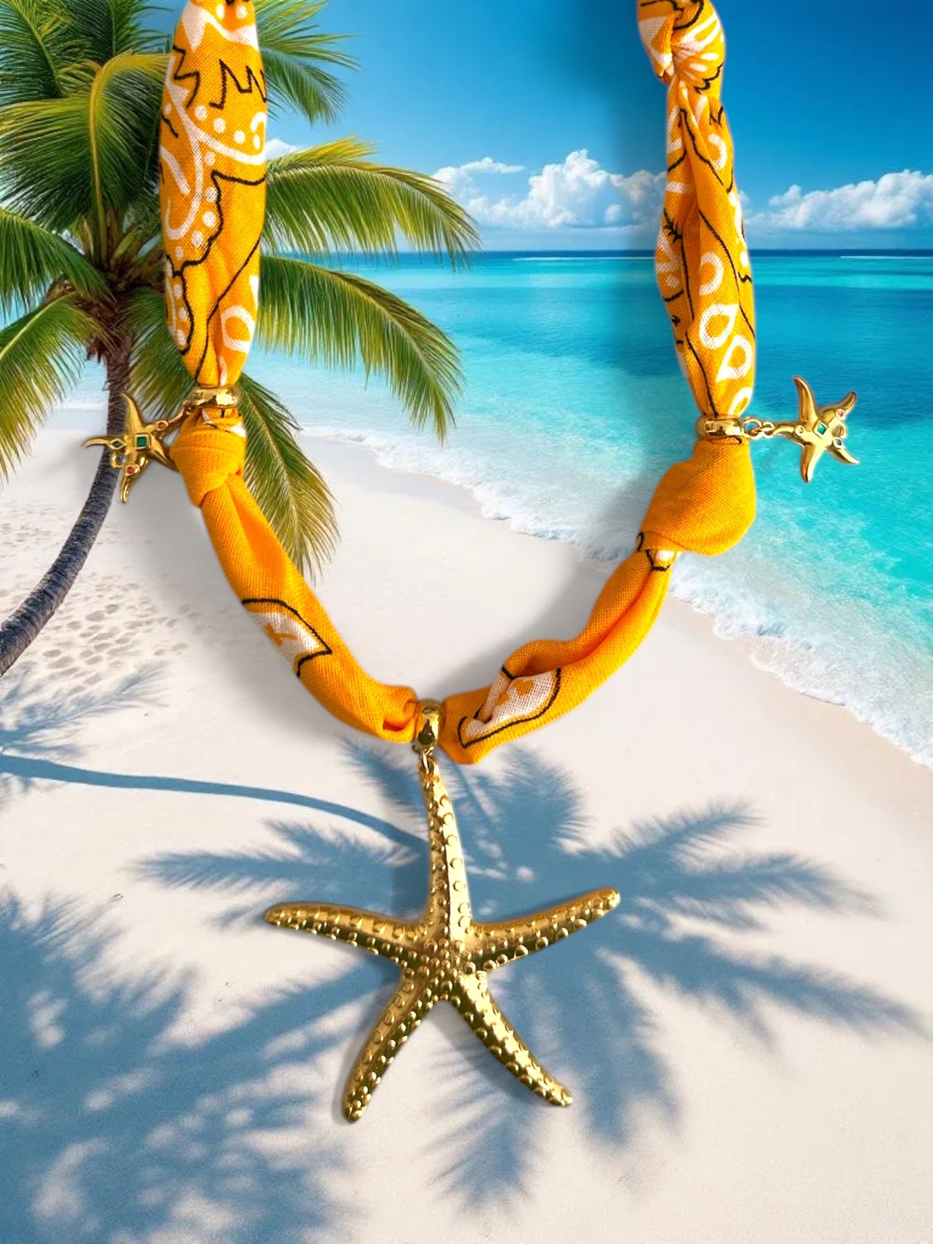 Yellow bandana necklace with starfish charms on a tropical beach