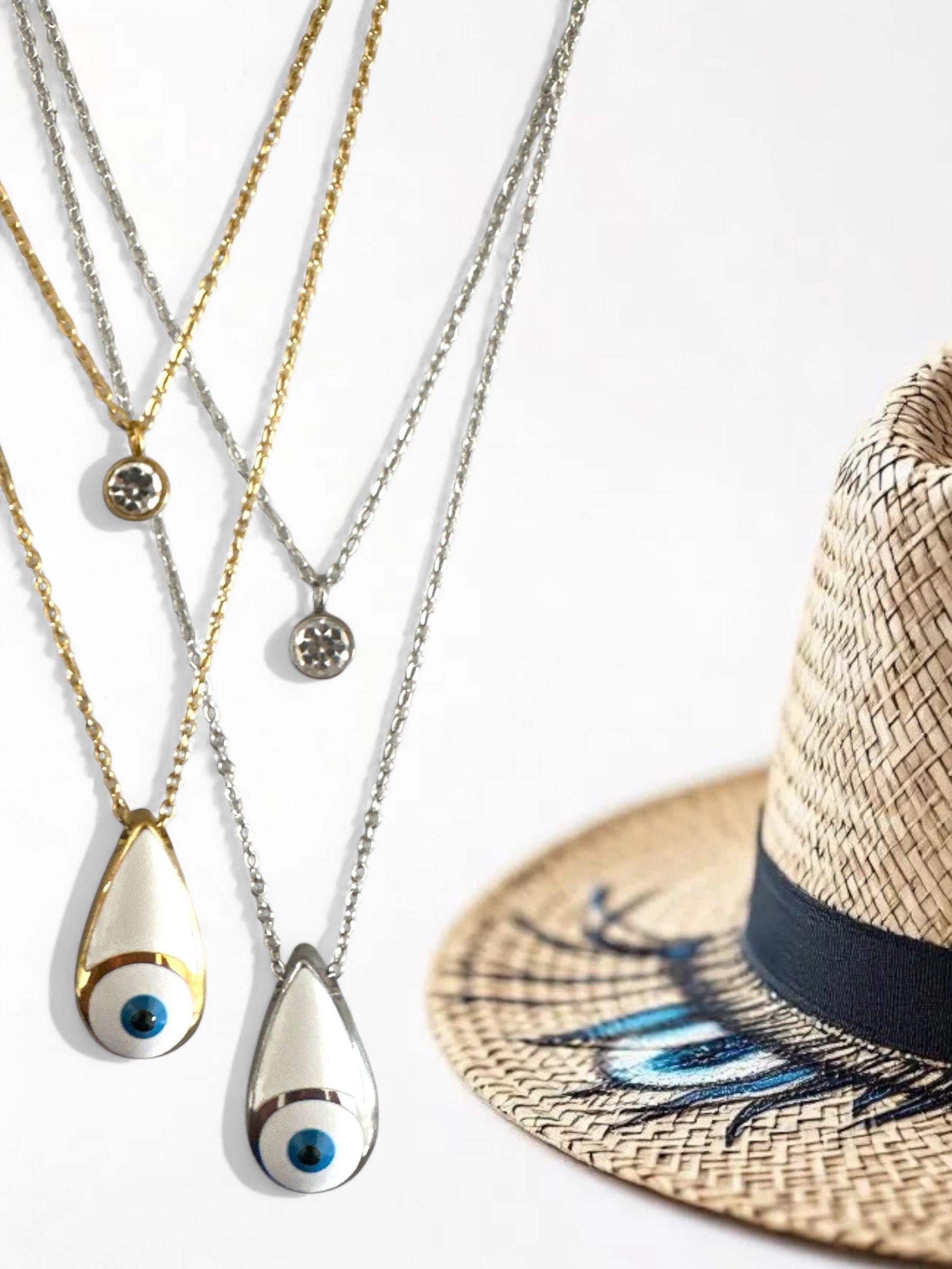 Διπλό ατσάλινο κολιέ σε χρυσό και ασημί με μοτίφ μάτι σε σχήμα δάκρυ και στρας