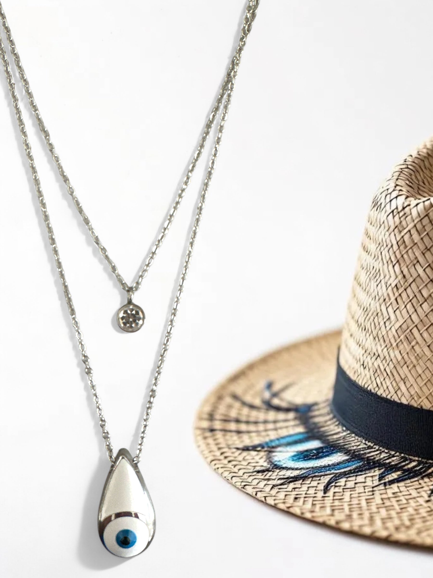 Διπλό ατσάλινο κολιέ σει ασημί με μοτίφ μάτι σε σχήμα δάκρυ και στρας