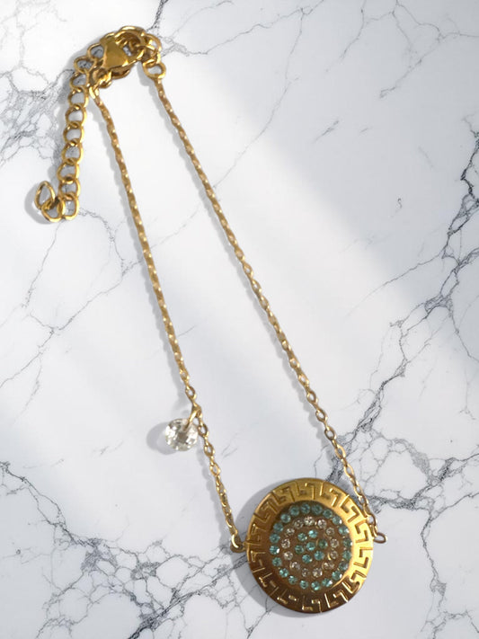 Ατσάλινα βραχιόλια με μοτίβο μαίανδρου και στρας σε χρυσό χρώμα