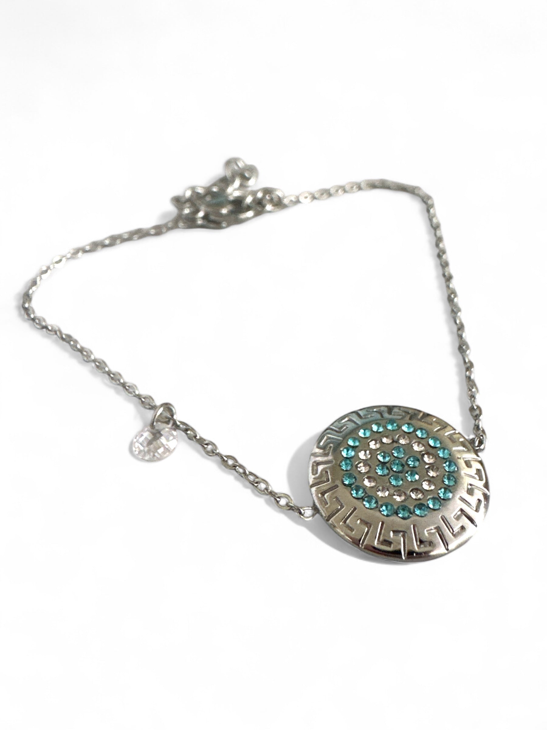 Ατσάλινα βραχιόλια με μοτίβο μαίανδρου και στρας σε χρυσό και ασημί χρώμα