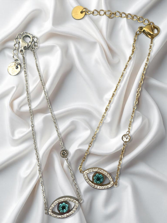 Ατσάλινα βραχιόλια με μάτι, στρας και κεντρική πέτρα σε χρυσό και ασημί φινίρισμα