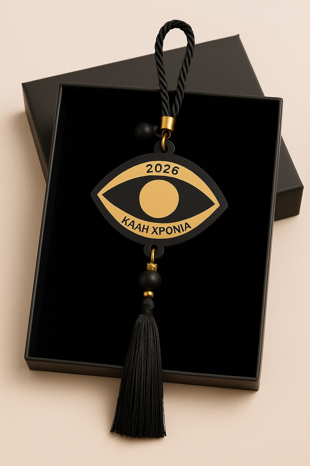 Γούρι μάτι 2026 από plexiglass μαύρο & χρυσό με φούντα – Συλλογή Symbolic Luxe – Χονδρική So Cute by Dimi