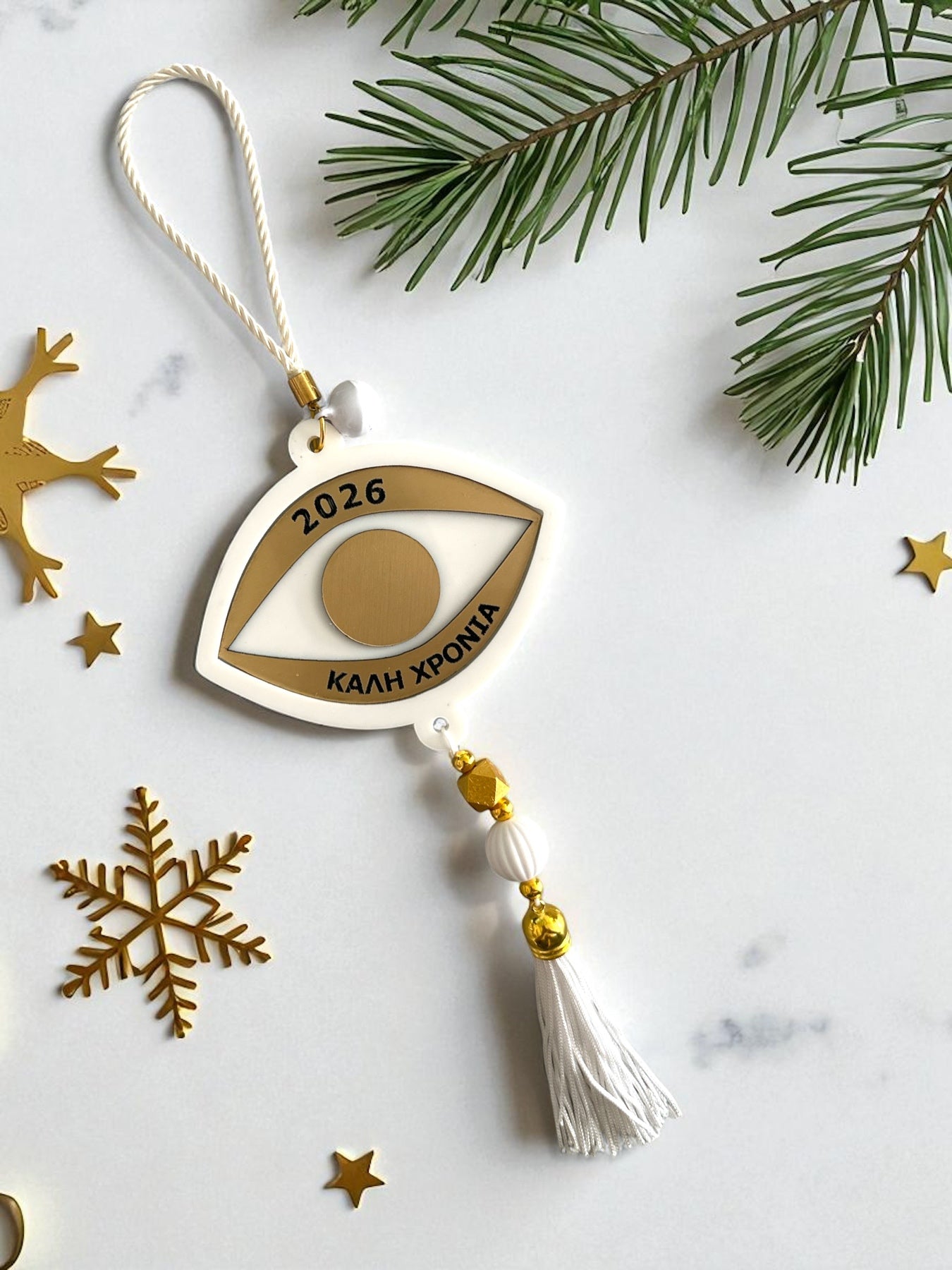 Γούρι μάτι 2026 από plexiglass λευκό & χρυσό με φούντα – Συλλογή Symbolic Luxe – Χονδρική So Cute by Dimi