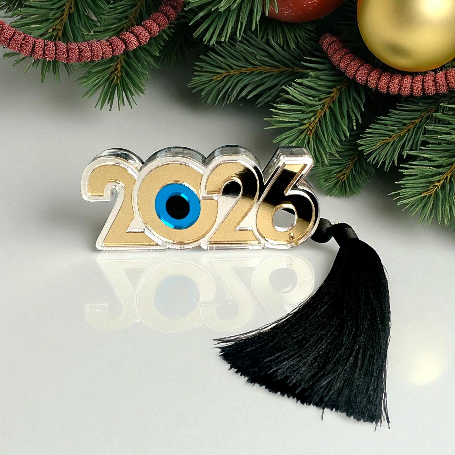 Γούρι 2026 plexiglass καθρέφτης χρυσό & ασημί με μάτι και φούντα – Χονδρική So Cute by Dimi