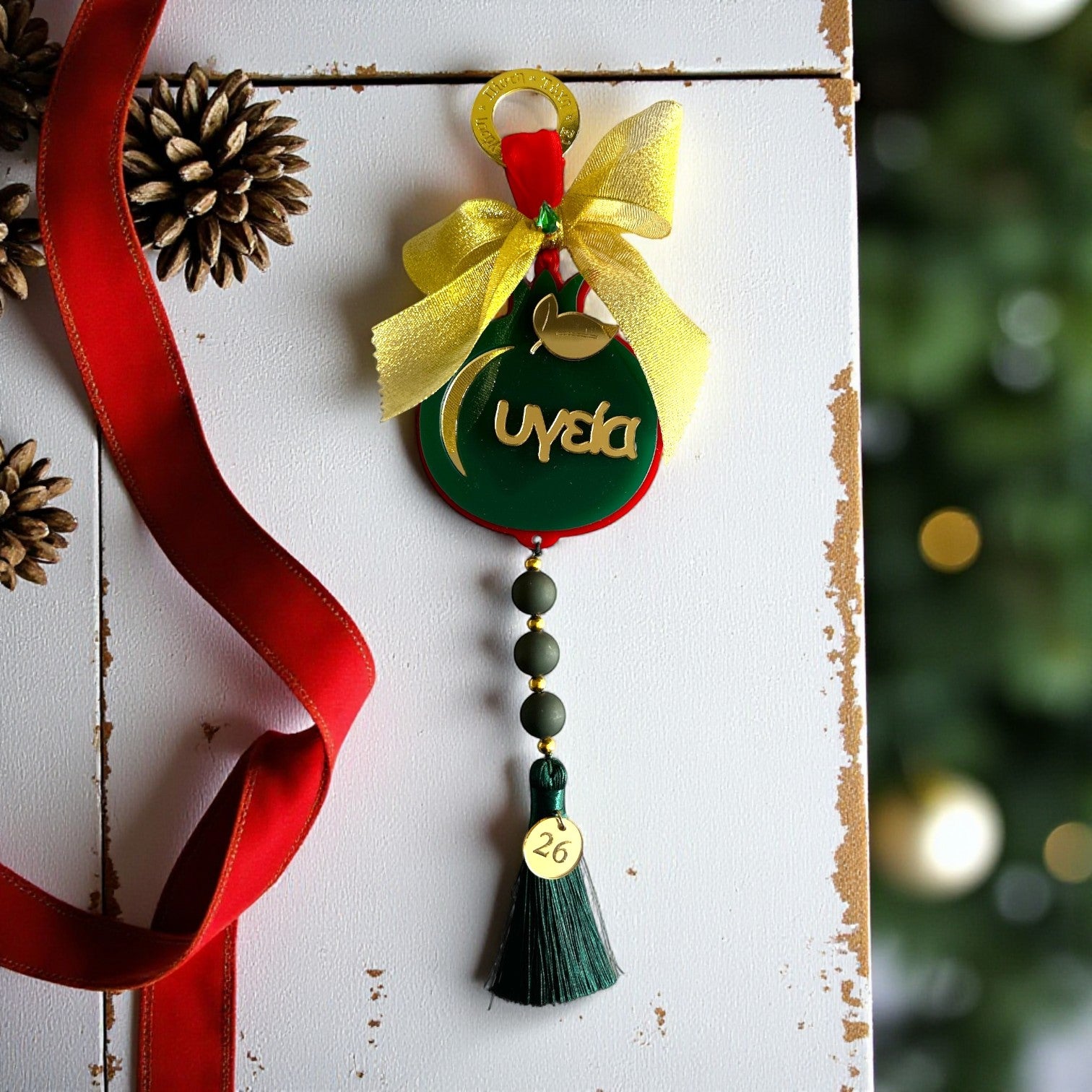 Γούρι 2026 ρόδι plexiglass κρεμαστό με επιγραφή Υγεία, φιόγκους & φούντα – Χονδρική So Cute by Dimi