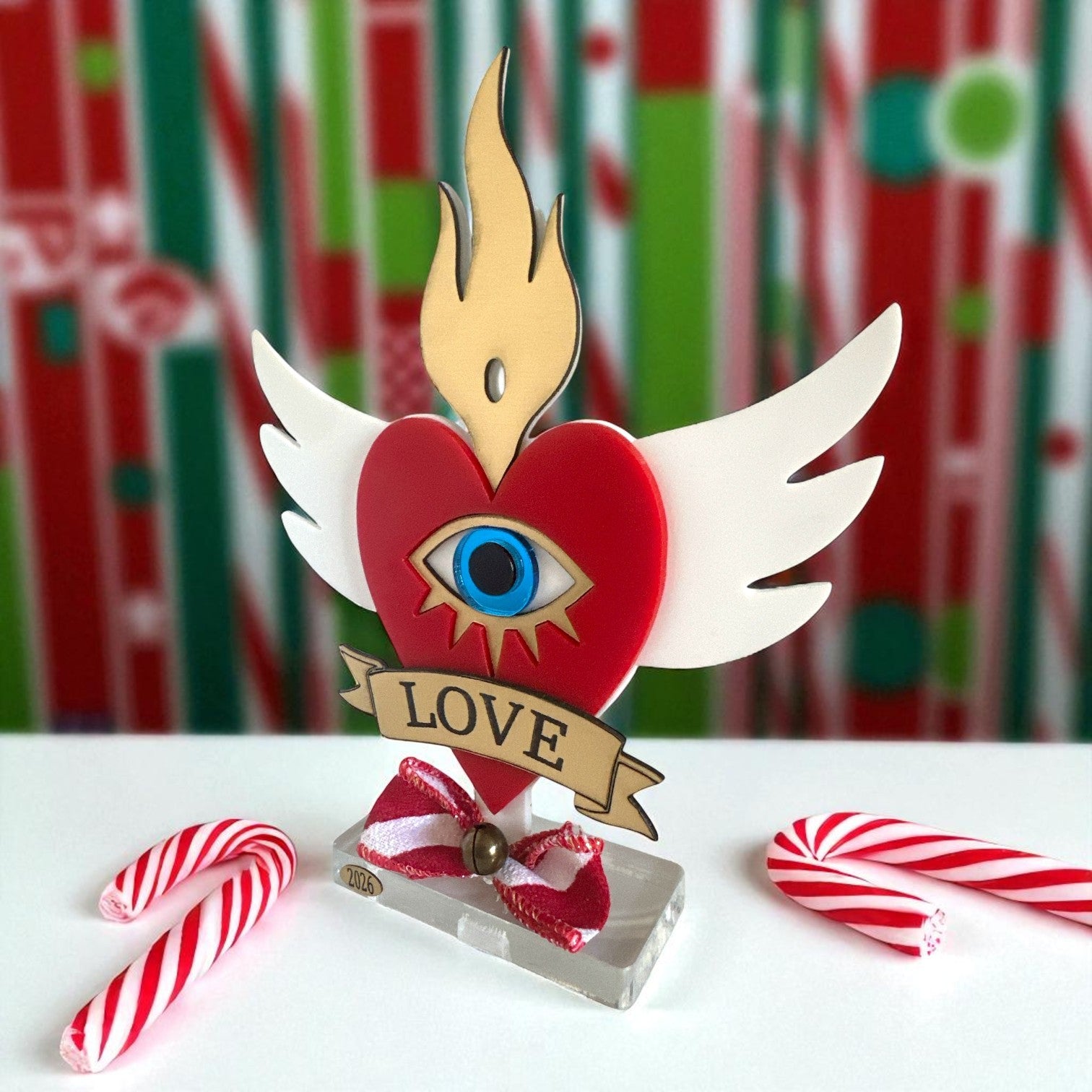 Χονδρικό επιτραπέζιο γούρι Christmas Pop Love Heart από plexiglass με μάτι, φλόγα & φτερά – So Cute by Dimi