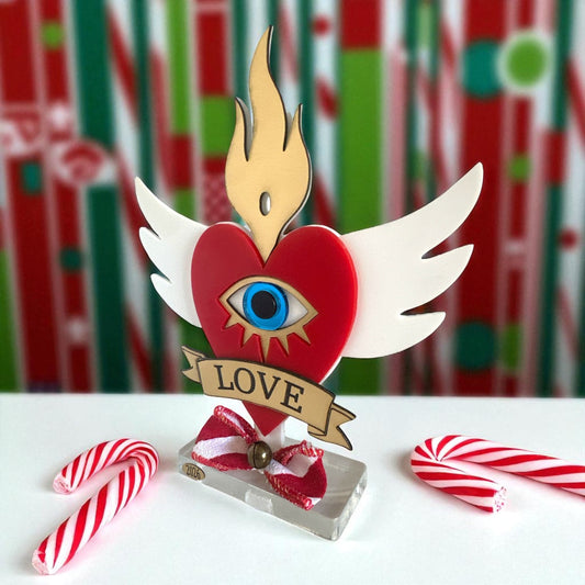 Χονδρικό επιτραπέζιο γούρι Christmas Pop Love Heart από plexiglass με μάτι, φλόγα & φτερά – So Cute by Dimi