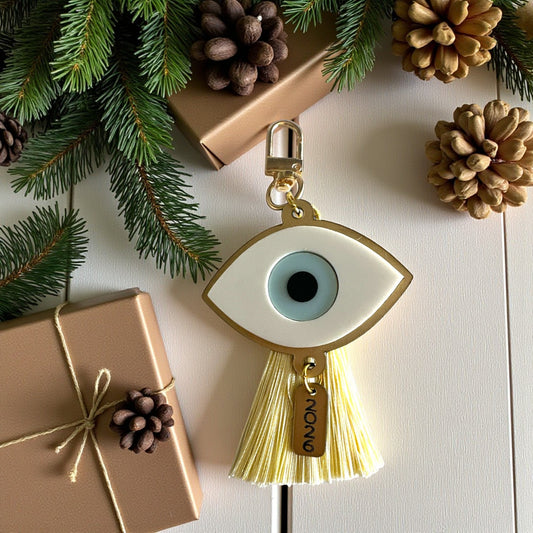 Μπρελόκ – charm τσάντας γούρι 2026 μάτι plexiglass χρυσό ματ με φούντα – Χονδρική So Cute by Dimi