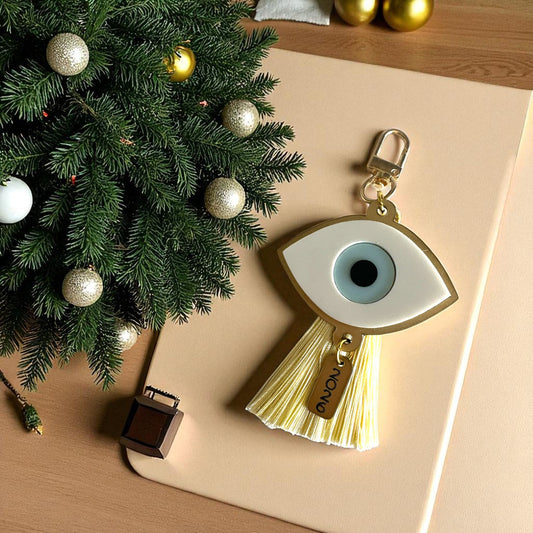 Μπρελόκ – charm τσάντας γούρι 2026 μάτι plexiglass χρυσό ματ με φούντα – Χονδρική So Cute by Dimi