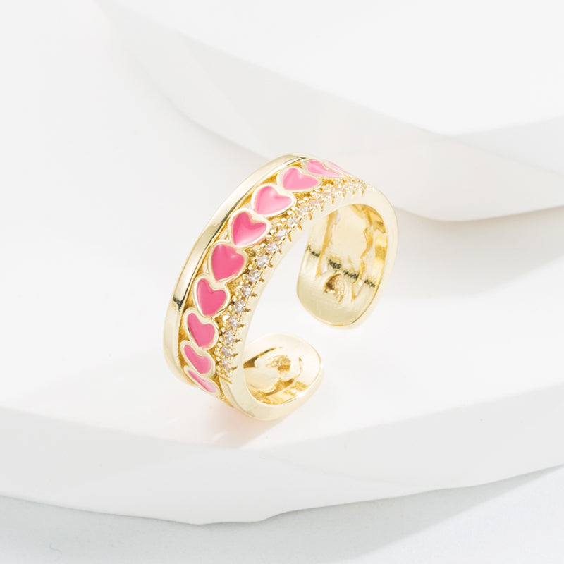 Ring with hearts and zircon