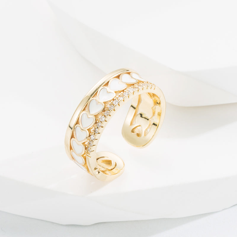 Ring with hearts and zircon