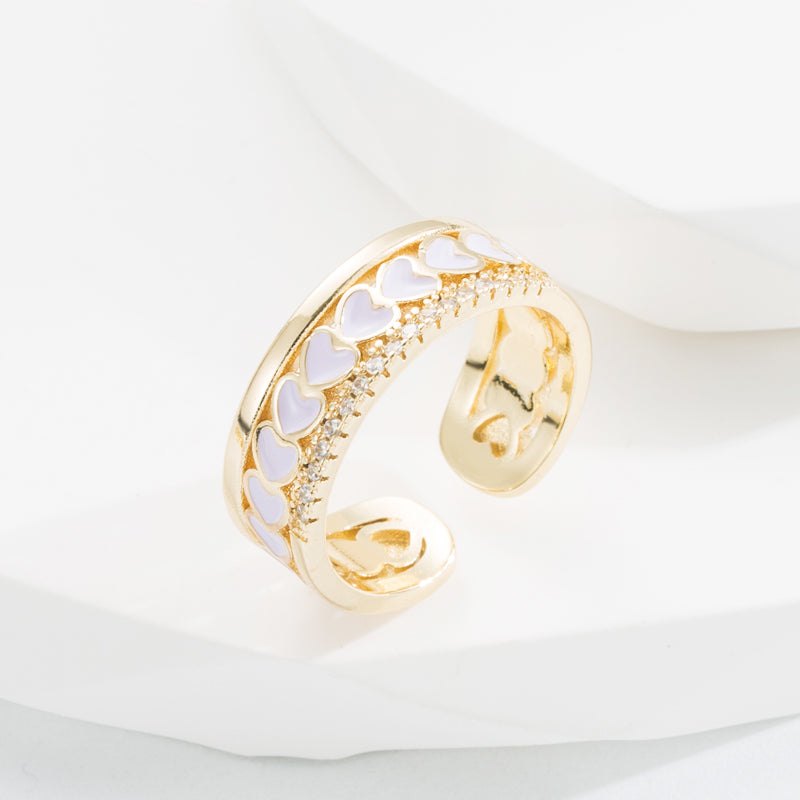 Ring with hearts and zircon