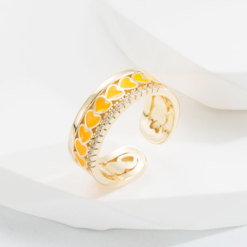 Ring with hearts and zircon