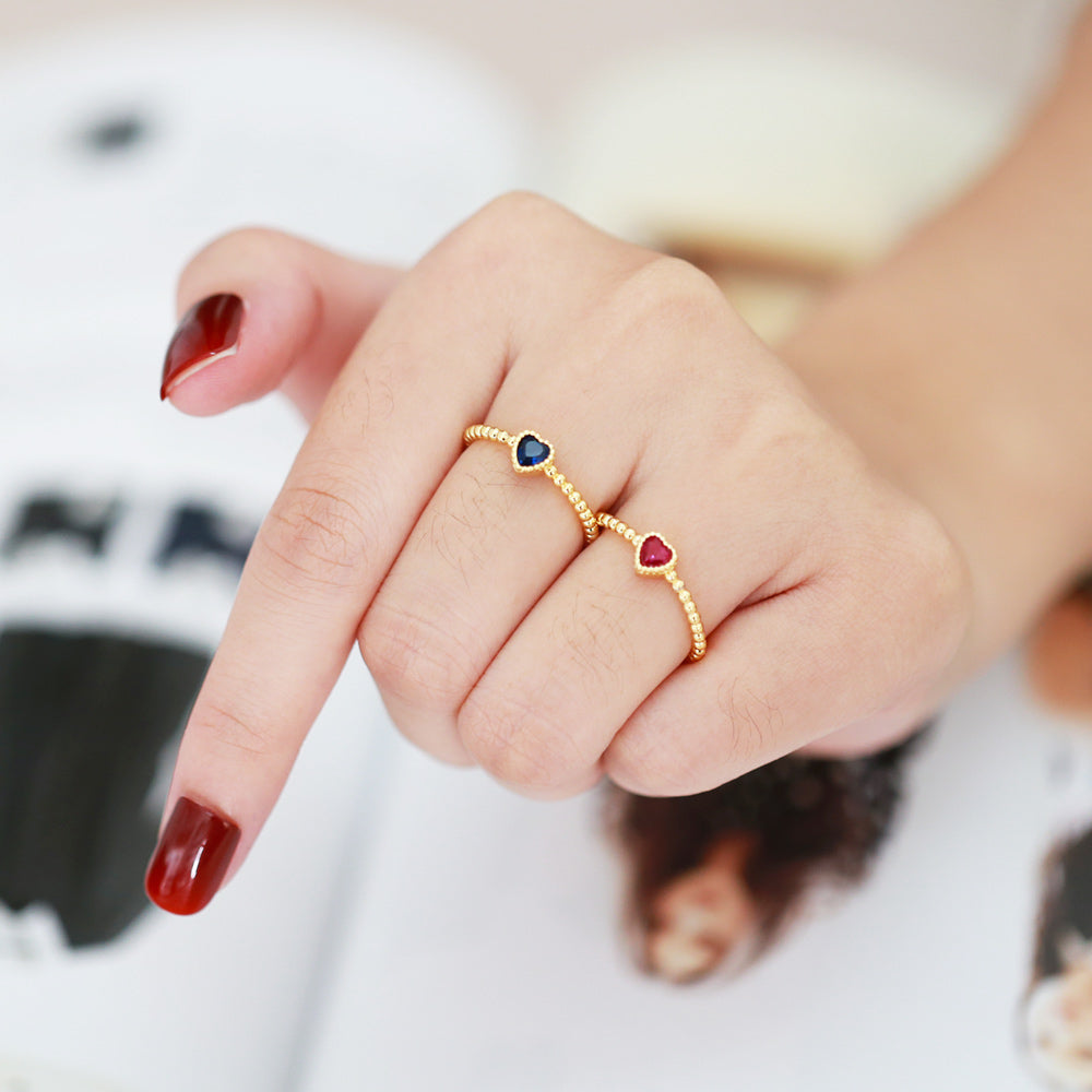 Brass ring with zircon heart