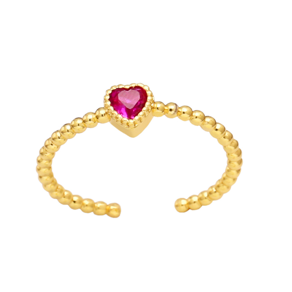 Brass ring with zircon heart