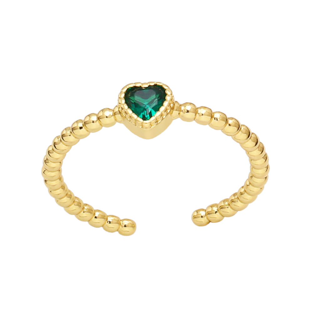 Brass ring with zircon heart