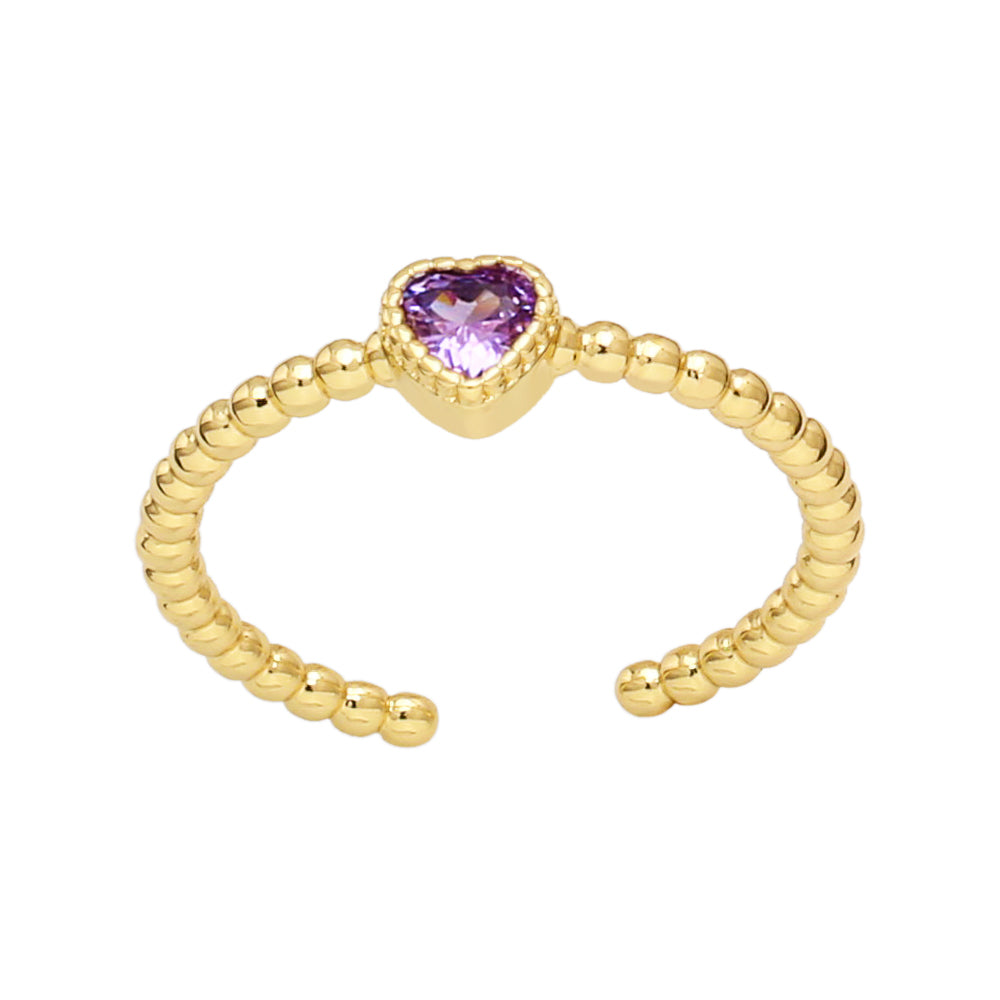 Brass ring with zircon heart