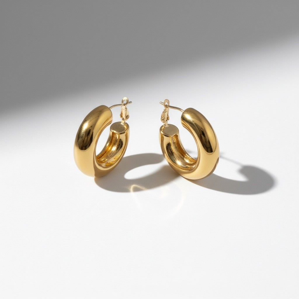 Bold Curve Hoops 30mm slim ατσάλινα σκουλαρίκια σε χρυσό  με καμπυλωτό design