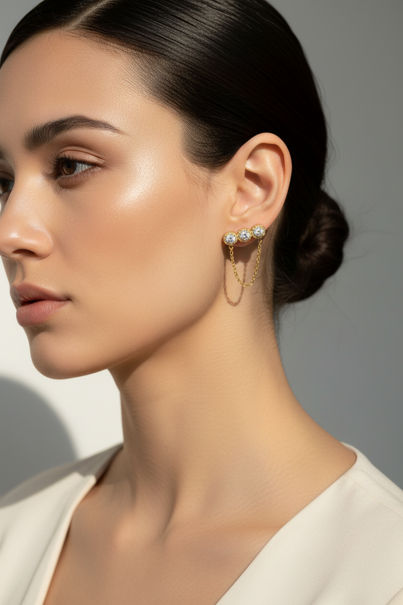 Trinity Chain Earrings ατσάλινα σκουλαρίκια με ζιργκόν και αλυσίδα σε χρυσό  – So Cute by Dimi