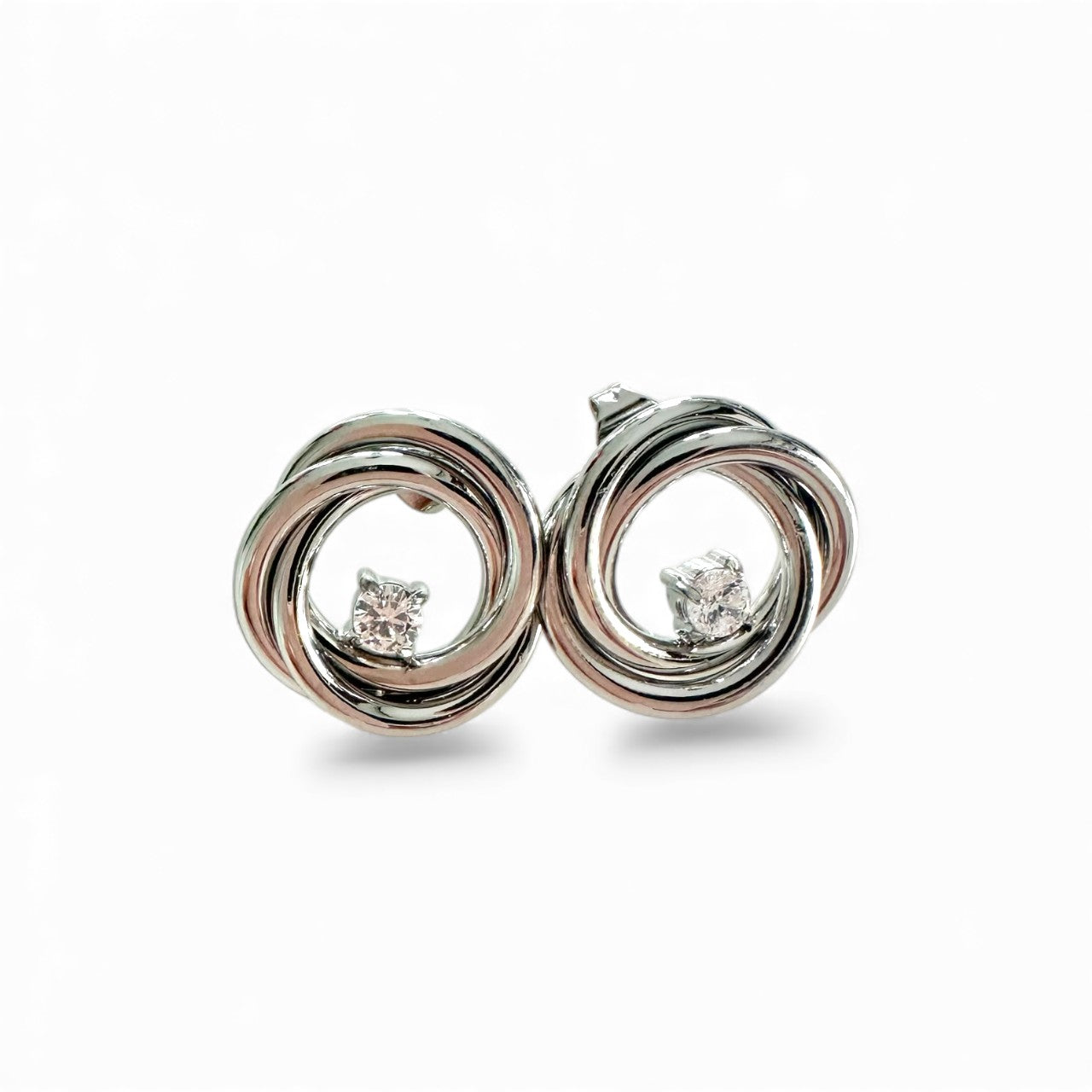 Stainless steel twisted stud earrings with central crystal in silver– So Cute by Dimi.