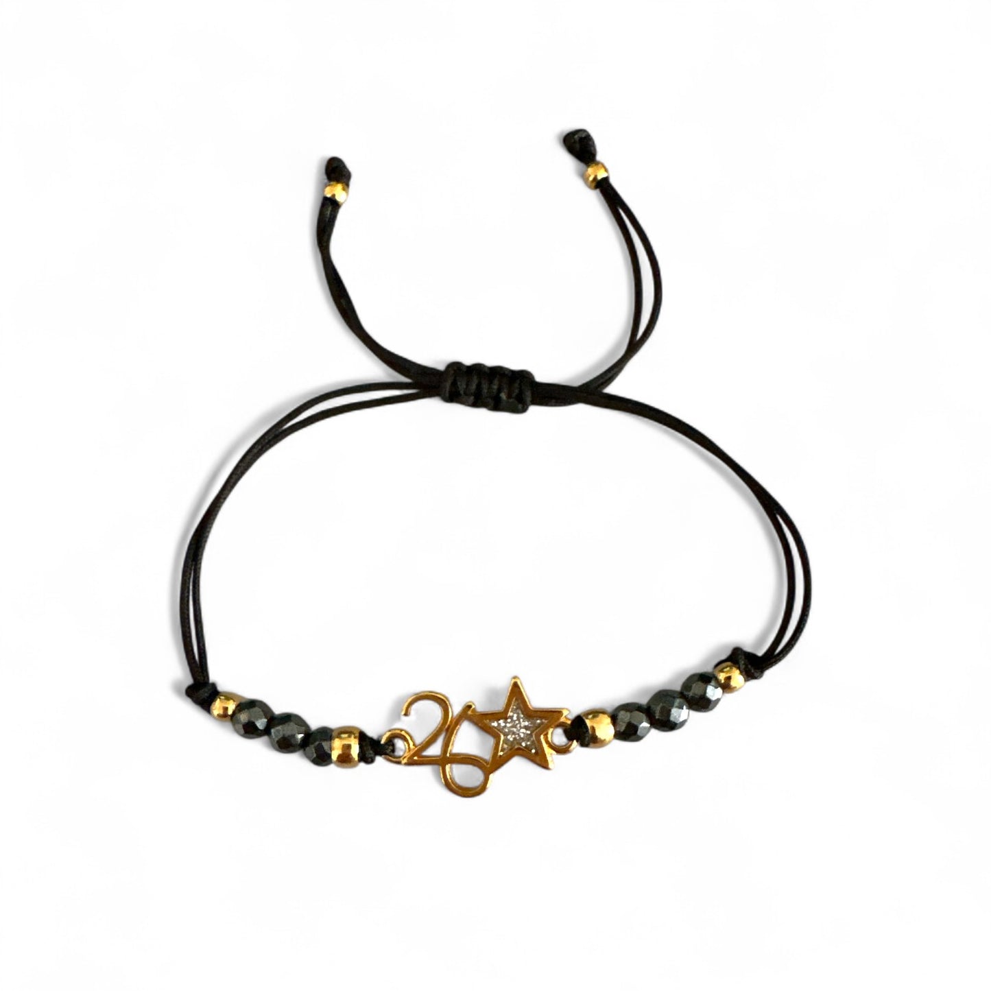 Χειροποίητο βραχιόλι γούρι 2026 με αιματίτη & αστεράκι glitter σε κορδόνι – So Cute by Dimi Wholesale