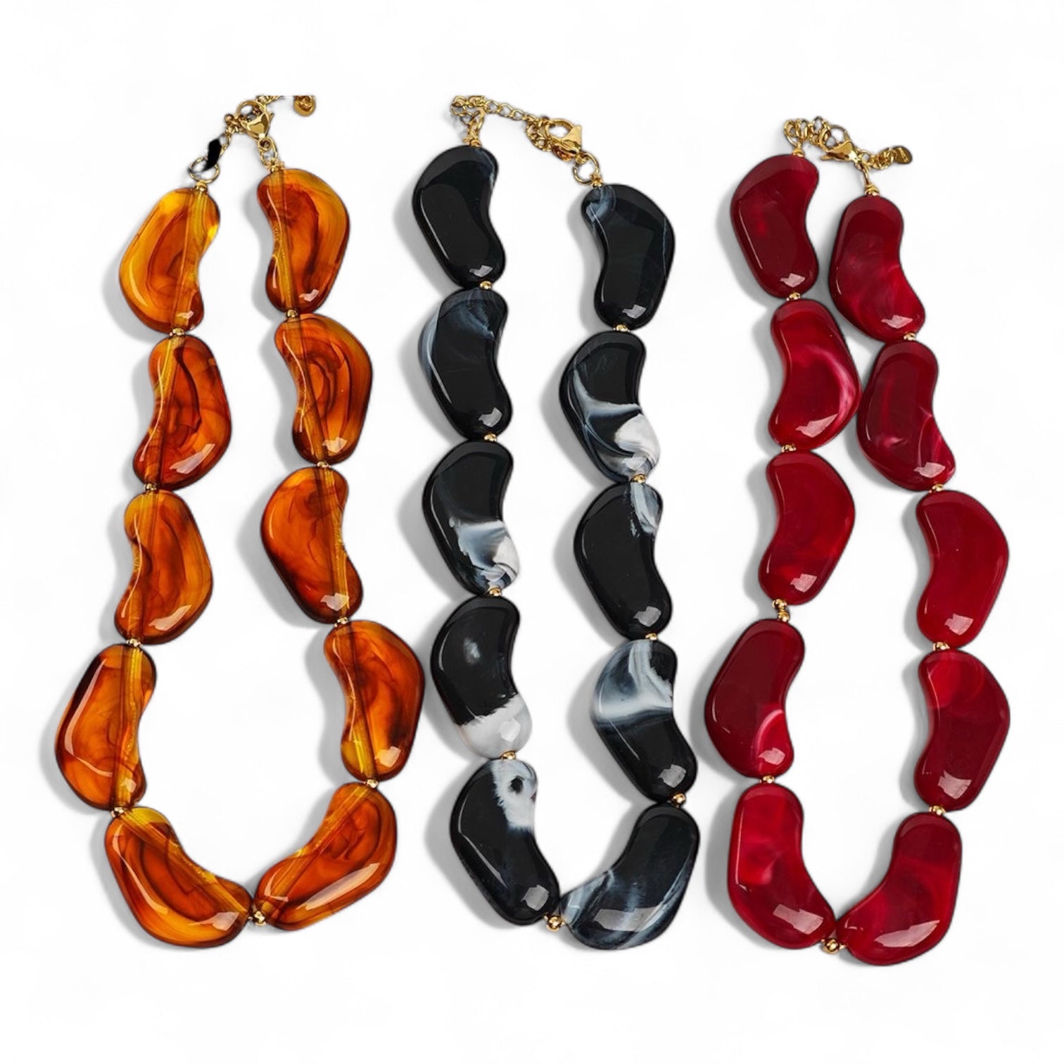 Κολιέ Molten Wave από ρητίνη και ατσάλι σε καραμελέ, μαύρο και κόκκινο — So Cute by Dimi Wholesale
