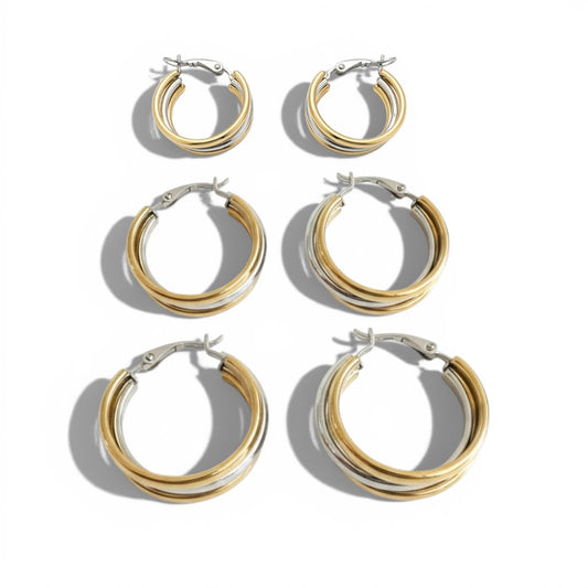 Δίχρωμα ατσάλινα σκουλαρίκια κρίκοι  με layered σχεδιασμό σε χρυσό και ασημί