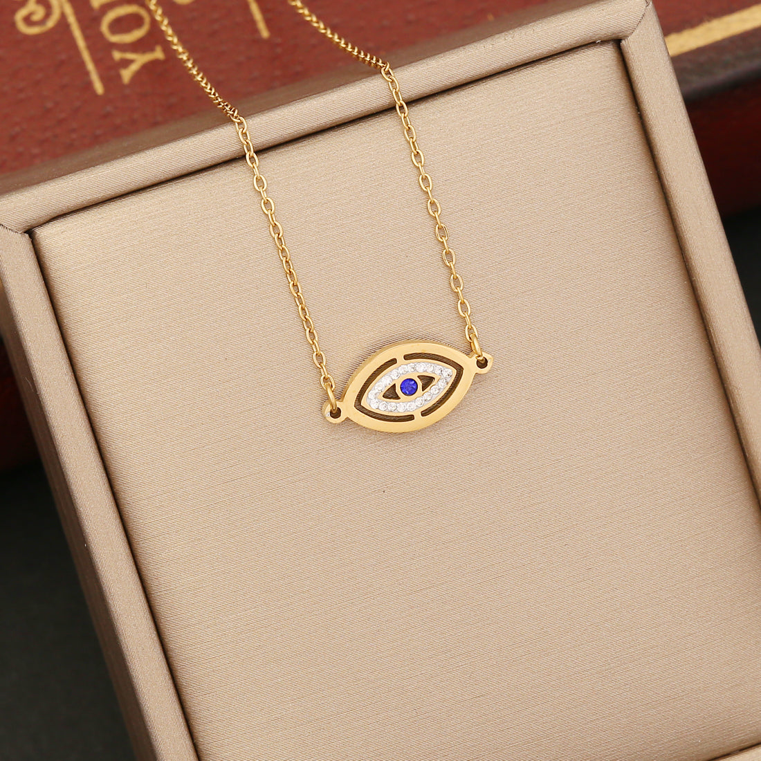 Fashion Devil'S Eye Stainless Steel Enamel Hollow Out Inlay Zircon Pendant Necklace