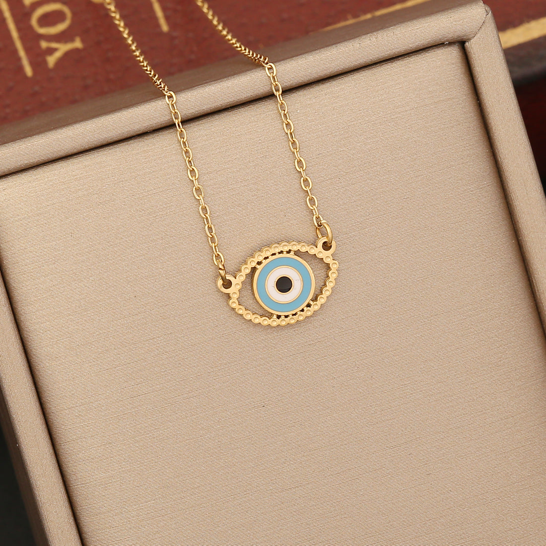 Fashion Devil'S Eye Stainless Steel Enamel Hollow Out Inlay Zircon Pendant Necklace