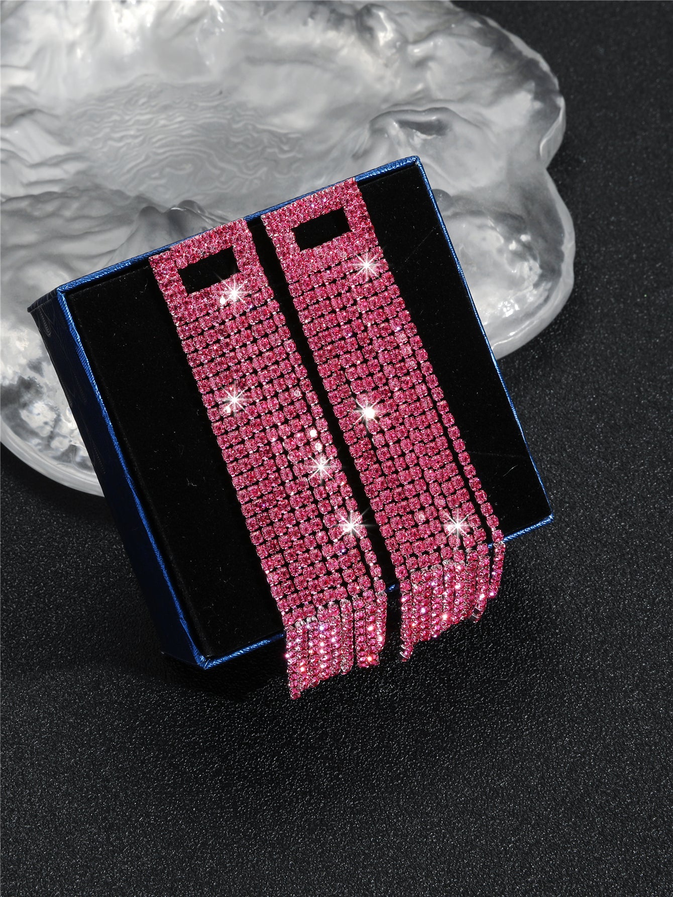 Long earrings with pink rhinestones