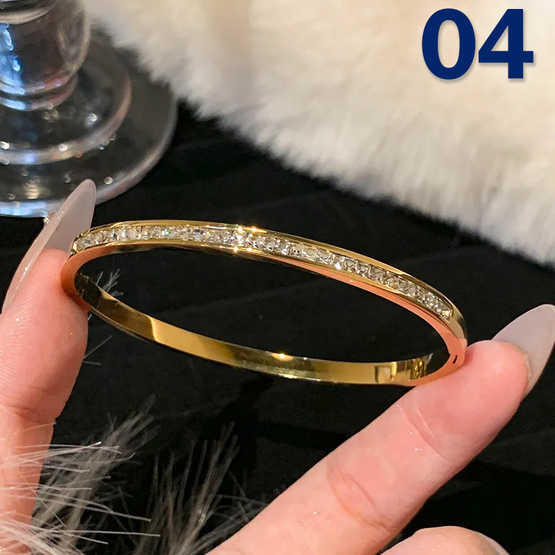 Elegant bangle βραχιόλια με ζιργκόν και κοχύλι σε διάφορα μοτίφ από επιχρυσωμένο ατσάλι τιτανίου