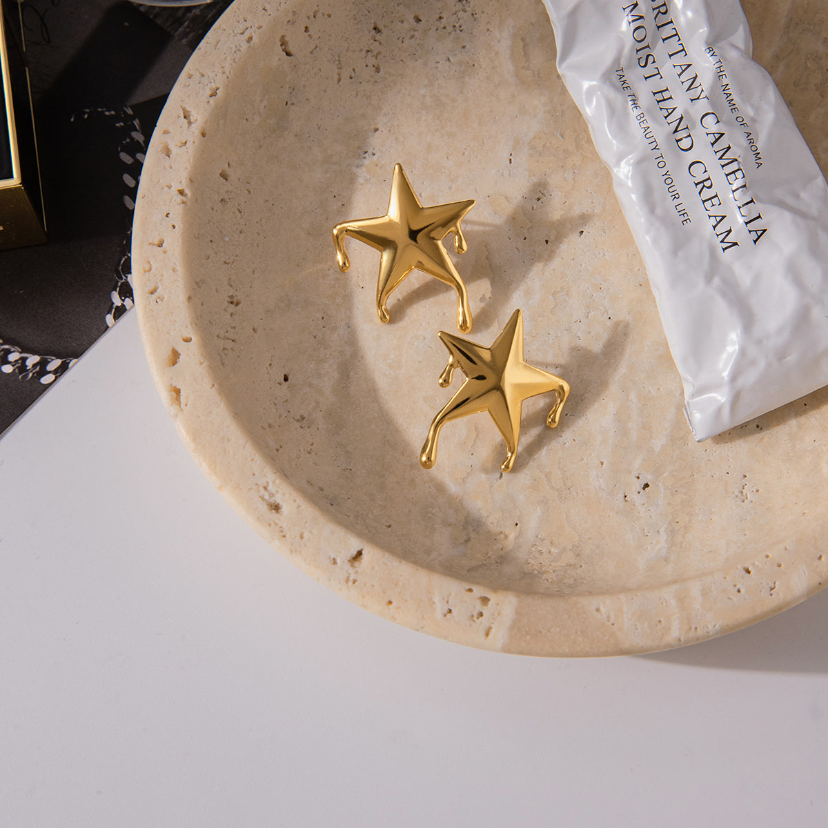 Ατσάλινα σκουλαρίκια liquid star επιχρυσωμένα 18K – Χονδρική So Cute by Dimi