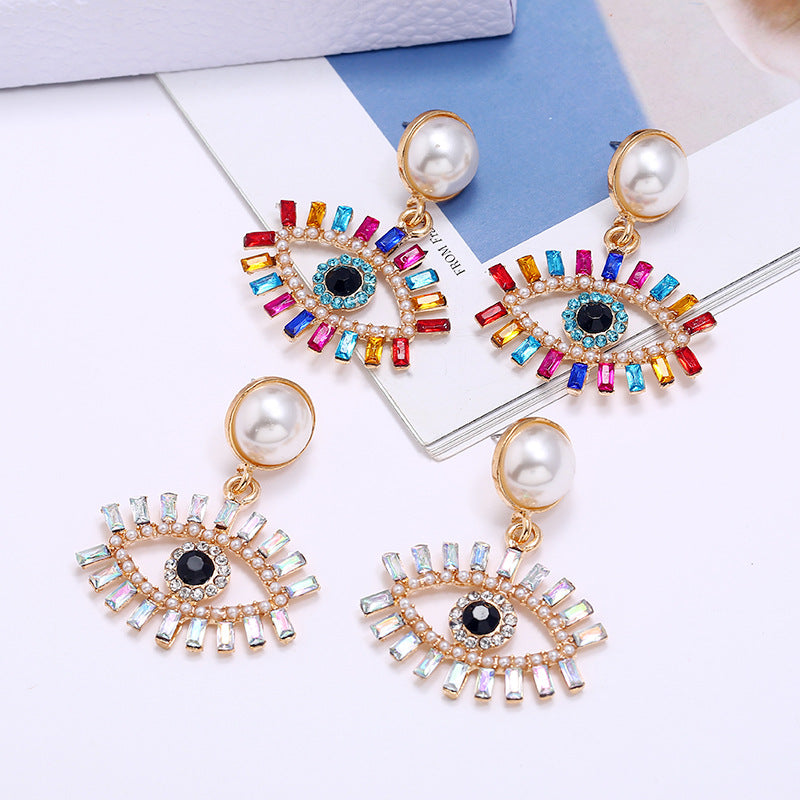 Exaggerated Devil's Eye Pearl Alloy Inlaid Colored Diamonds Earrings
