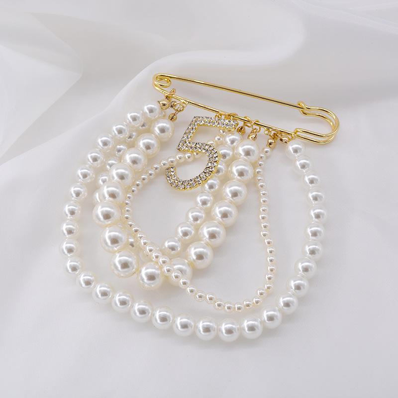 No 5 pearls brooch