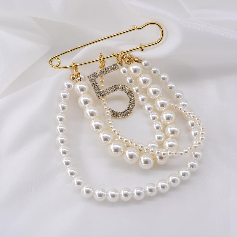 No 5 pearls brooch