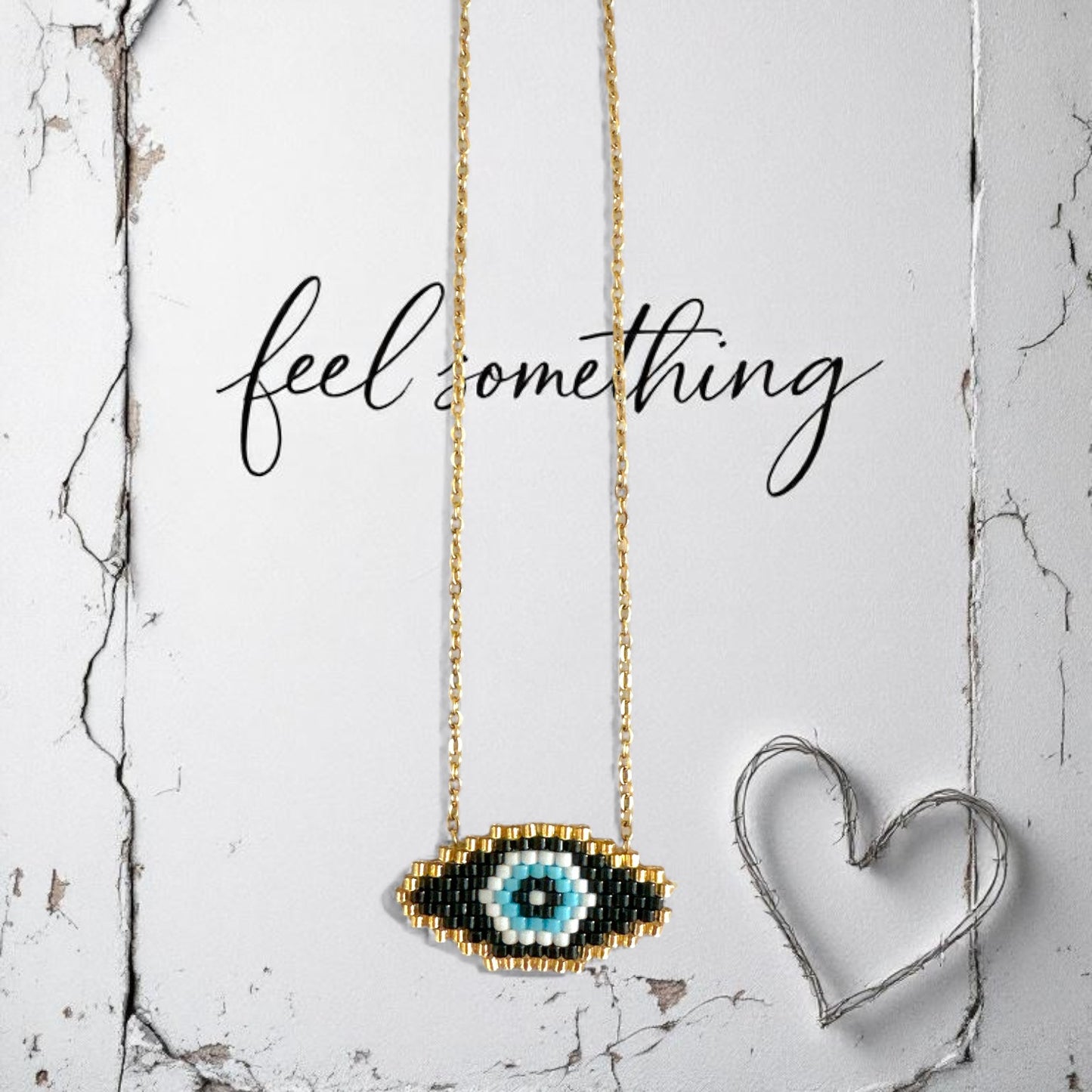 Χρυσό ατσάλινο κολιέ με eye charm Miyuki So Cute by Dimi