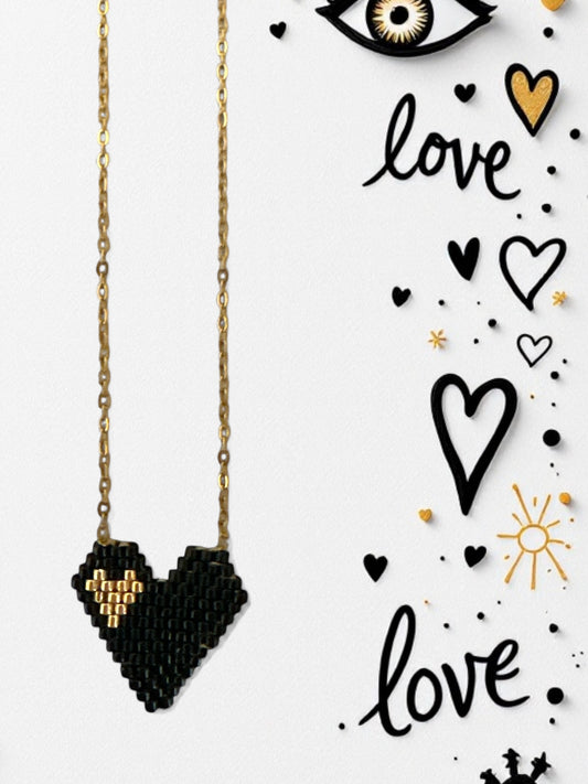 Black & Gold Heart ατσάλινο κολιέ Miyuki με μαύρη καρδιά και χρυσή λεπτομέρεια – Χονδρική So Cute by Dimi